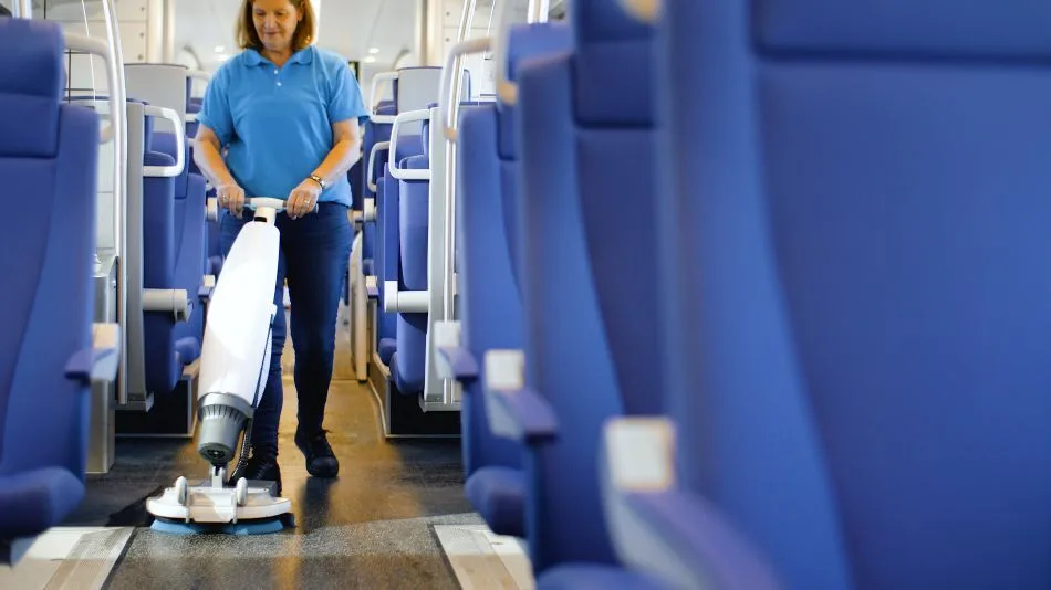 Imop lite cleaning a train