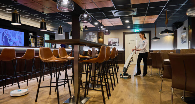 imop Lite Pro cleaning a food and beverage bar
